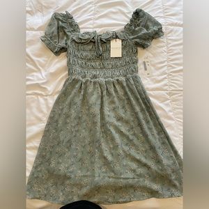 Never worn Mini Sundress. Size small